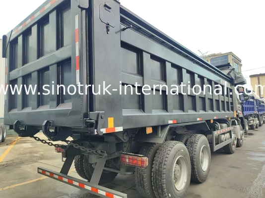 HOWO NX 380HP RHD کامیون سیاه و سفید با فلاک پلین