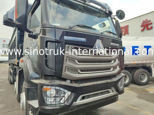 HOWO NX 380HP RHD کامیون سیاه و سفید با فلاک پلین